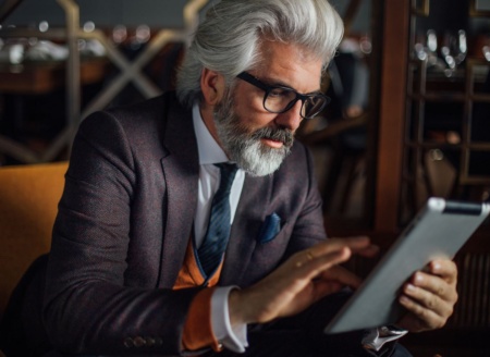 Client checking information on his tablet 2